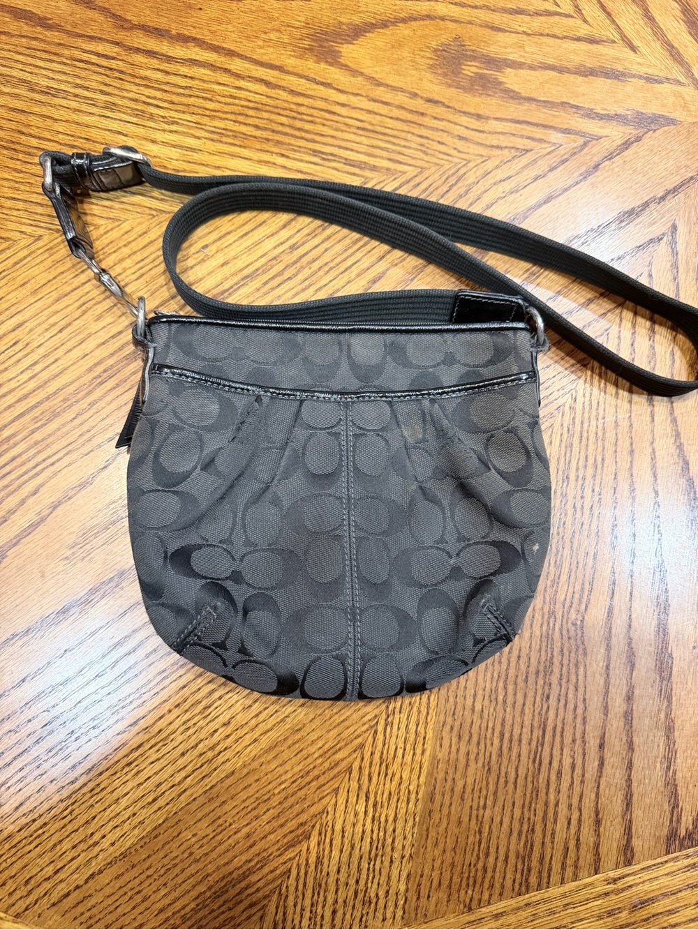 Coach Signature Jacquard pleated swing-pack crossbody, black